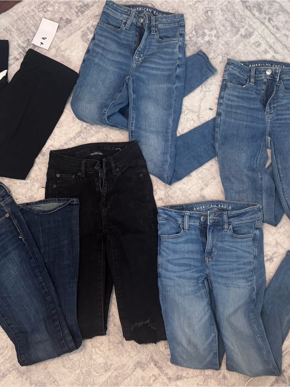 AE Women’s Skinny Jeans in Blue and Black &one pair of girls Nike XL leggings